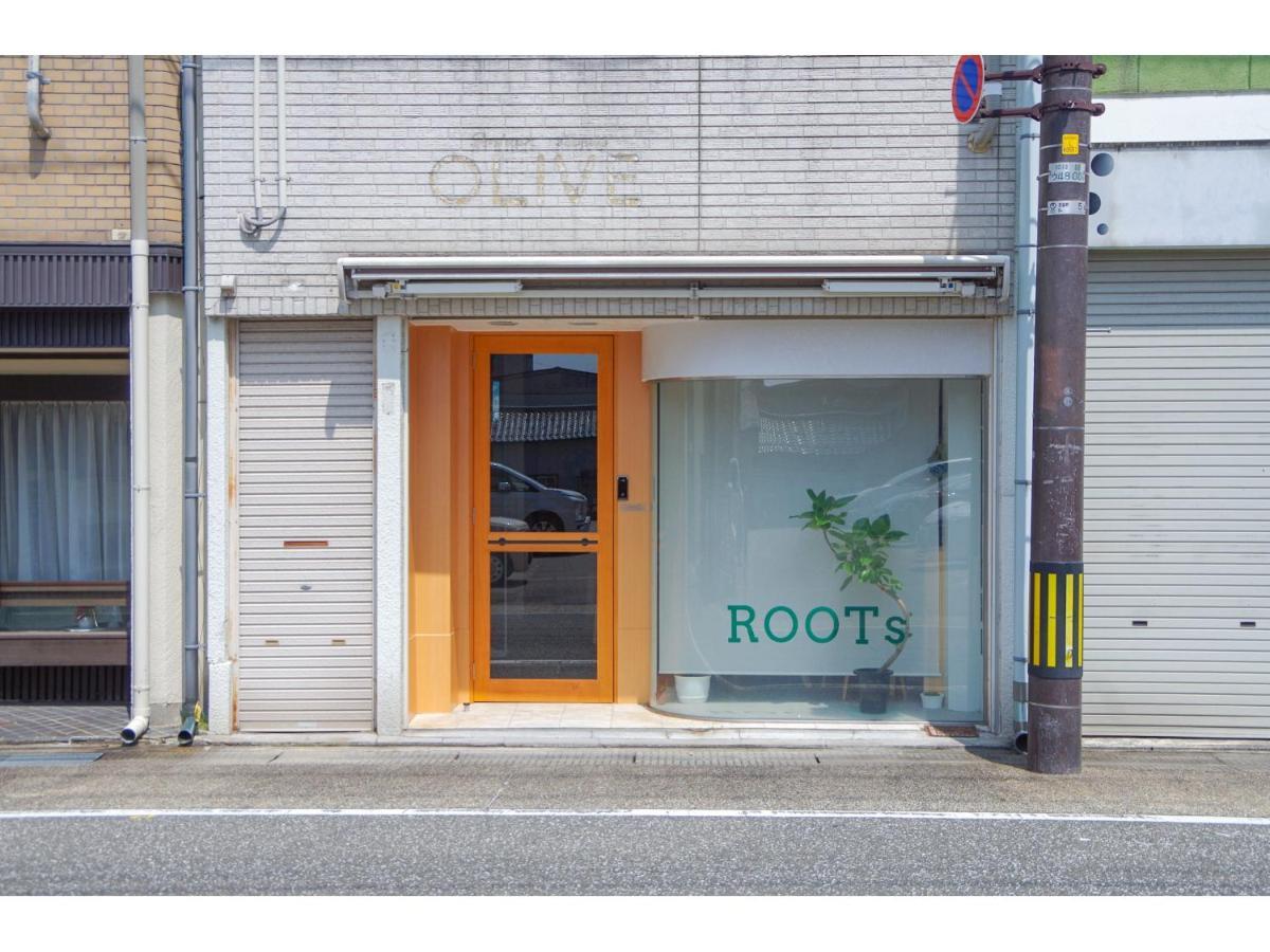 Auberge de jeunesse Travelers' House Roots à Takaoka Extérieur photo